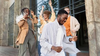 Students cheer as they receive their offer to study abroad.